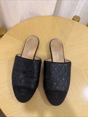 CHANEL Black Quilted Leather Slide Mules
